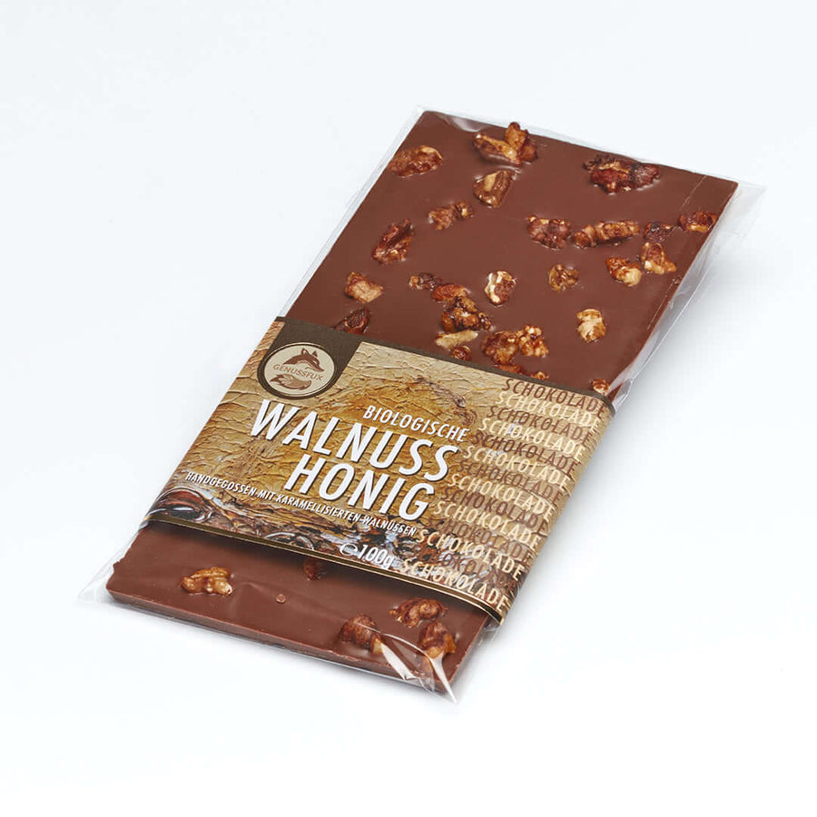 Handgeschöpfte Bio-Walnuss-Honig-Schokolade mit karamellisierten Walnüssen, reiner Kakaobutter und FairTrade-zertifizierung